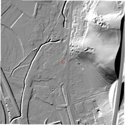 Shaded relief map of the ground around DE215DQ, computed from Environment Agency LiDAR. The ground here sits at about 52 m above sea level and falls 55 m across the surrounding 800 m. Surface water reaching this point runs off ground lying to the north-north-east, 2.1 m higher.