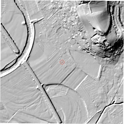 Shaded relief map of the ground around DE215DX, computed from Environment Agency LiDAR. The ground here sits at about 52 m above sea level and falls 40 m across the surrounding 800 m. Surface water reaching this point runs off ground lying to the north-east, 32.8 m higher.