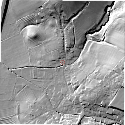Shaded relief map of the ground around DE215LL, computed from Environment Agency LiDAR. The ground here sits at about 57 m above sea level and falls 31 m across the surrounding 800 m. Surface water reaching this point runs off ground lying to the north, 24.7 m higher.