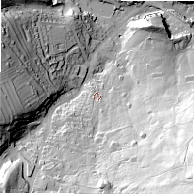Shaded relief map of the ground around DE43QZ, computed from Environment Agency LiDAR. The ground here sits at about 117 m above sea level and falls 122 m across the surrounding 800 m. Surface water reaching this point runs off ground lying to the south-south-east, 63.1 m higher.