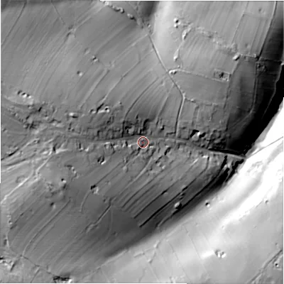 Shaded relief map of the ground around DE451QS, computed from Environment Agency LiDAR. The ground here sits at about 311 m above sea level and falls 60 m across the surrounding 800 m. Surface water reaching this point runs off ground lying to the west-north-west, 21.1 m higher.