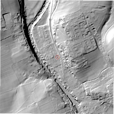 Shaded relief map of the ground around DE451RR, computed from Environment Agency LiDAR. The ground here sits at about 115 m above sea level and falls 35 m across the surrounding 800 m. Surface water reaching this point runs off ground lying to the north-east, 16.3 m higher.