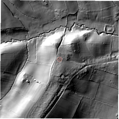 Shaded relief map of the ground around DE557ND, computed from Environment Agency LiDAR. The ground here sits at about 111 m above sea level and falls 39 m across the surrounding 800 m. Surface water reaching this point runs off ground lying to the south, 2.2 m higher.