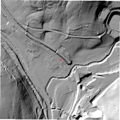 Shaded relief map of the ground around DE562EL, computed from Environment Agency LiDAR. The ground here sits at about 69 m above sea level and falls 67 m across the surrounding 800 m. Surface water reaching this point runs off ground lying to the north-north-west, 9.3 m higher.