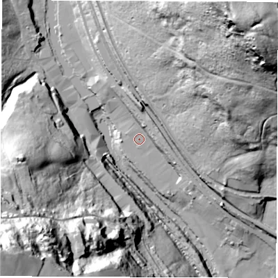 Shaded relief map of the ground around DE562HE, computed from Environment Agency LiDAR. The ground here sits at about 70 m above sea level and falls 115 m across the surrounding 800 m. Surface water reaching this point runs off ground lying to the east-north-east, 8.0 m higher.