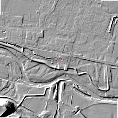 Shaded relief map of the ground around DE655DX, computed from Environment Agency LiDAR. The ground here sits at about 54 m above sea level and falls 38 m across the surrounding 800 m. Surface water reaching this point runs off ground lying to the west, 3.7 m higher.