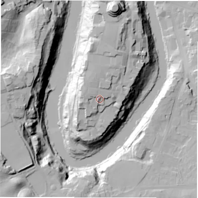 Shaded relief map of the ground around DH13EQ, computed from Environment Agency LiDAR. The ground here sits at about 63 m above sea level and falls 47 m across the surrounding 800 m. Surface water reaching this point runs off ground lying to the west-north-west, 2.6 m higher.