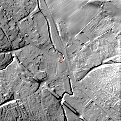 Shaded relief map of the ground around DH70LE, computed from Environment Agency LiDAR. The ground here sits at about 114 m above sea level and falls 65 m across the surrounding 800 m. Surface water reaching this point runs off ground lying to the south, 0.9 m higher.