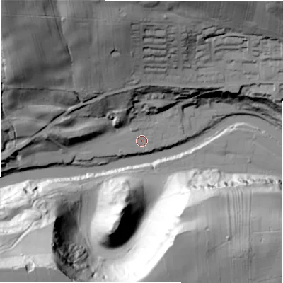 Shaded relief map of the ground around DL104TP, computed from Environment Agency LiDAR. The ground here sits at about 107 m above sea level and falls 92 m across the surrounding 800 m. Surface water reaching this point runs off ground lying to the north-west, 70.6 m higher.