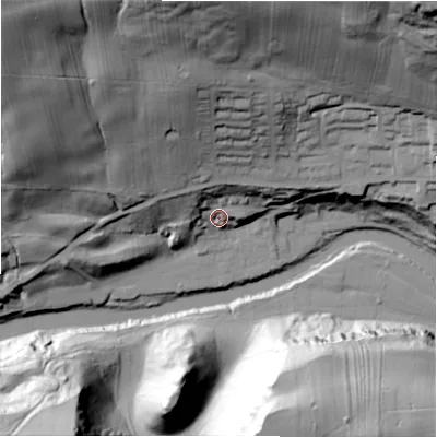 Shaded relief map of the ground around DL104TR, computed from Environment Agency LiDAR. The ground here sits at about 112 m above sea level and falls 85 m across the surrounding 800 m. Surface water reaching this point runs off ground lying to the north-north-west, 68.7 m higher.