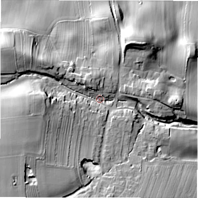Shaded relief map of the ground around DL105NB, computed from Environment Agency LiDAR. The ground here sits at about 142 m above sea level and falls 35 m across the surrounding 800 m. Surface water reaching this point runs off ground lying to the south-west, 19.8 m higher.