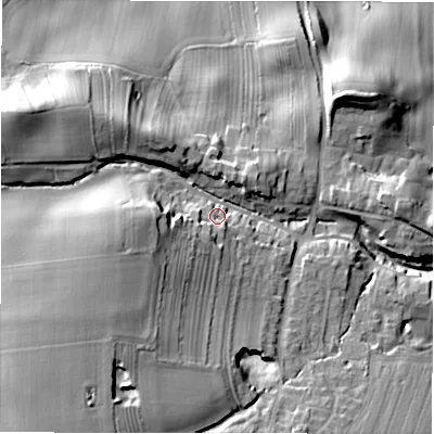 Shaded relief map of the ground around DL105ND, computed from Environment Agency LiDAR. The ground here sits at about 145 m above sea level and falls 34 m across the surrounding 800 m. Surface water reaching this point runs off ground lying to the south-west, 16.4 m higher.