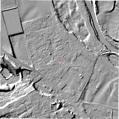 Shaded relief map of the ground around DL107LA, computed from Environment Agency LiDAR. The ground here sits at about 52 m above sea level and falls 19 m across the surrounding 800 m. Surface water reaching this point runs off ground lying to the west, 11.2 m higher.