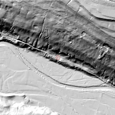 Shaded relief map of the ground around DL116LF, computed from Environment Agency LiDAR. The ground here sits at about 222 m above sea level and falls 189 m across the surrounding 800 m. Surface water reaching this point runs off ground lying to the north-north-east, 173.2 m higher.