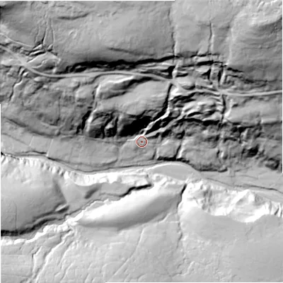 Shaded relief map of the ground around DL116LR, computed from Environment Agency LiDAR. The ground here sits at about 389 m above sea level and falls 129 m across the surrounding 800 m. Surface water reaching this point runs off ground lying to the north, 100.9 m higher.