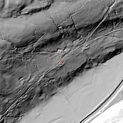 Shaded relief map of the ground around DL116PE, computed from Environment Agency LiDAR. The ground here sits at about 239 m above sea level and falls 166 m across the surrounding 800 m. Surface water reaching this point runs off ground lying to the north-west, 124.5 m higher.