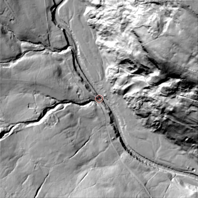 Shaded relief map of the ground around DL116RD, computed from Environment Agency LiDAR. The ground here sits at about 256 m above sea level and falls 171 m across the surrounding 800 m. Surface water reaching this point runs off ground lying to the north-east, 166.0 m higher.
