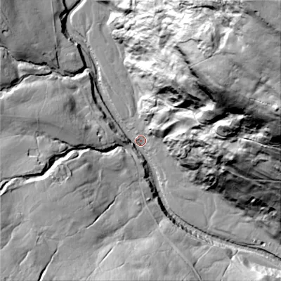 Shaded relief map of the ground around DL116RF, computed from Environment Agency LiDAR. The ground here sits at about 254 m above sea level and falls 175 m across the surrounding 800 m. Surface water reaching this point runs off ground lying to the north-east, 169.8 m higher.