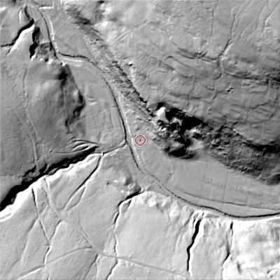 Shaded relief map of the ground around DL116RT, computed from Environment Agency LiDAR. The ground here sits at about 297 m above sea level and falls 97 m across the surrounding 800 m. Surface water reaching this point runs off ground lying to the north-north-east, 35.8 m higher.