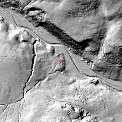 Shaded relief map of the ground around DL116RU, computed from Environment Agency LiDAR. The ground here sits at about 284 m above sea level and falls 85 m across the surrounding 800 m. Surface water reaching this point runs off ground lying to the west-south-west, 38.6 m higher.