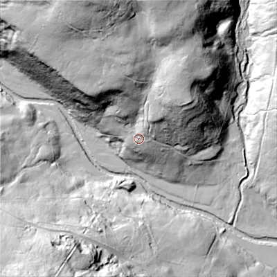 Shaded relief map of the ground around DL116RW, computed from Environment Agency LiDAR. The ground here sits at about 295 m above sea level and falls 88 m across the surrounding 800 m. Surface water reaching this point runs off ground lying to the north-east, 34.0 m higher.