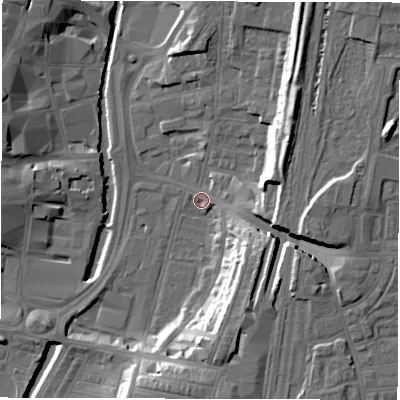 Shaded relief map of the ground around DL11RX, computed from Environment Agency LiDAR. The ground here sits at about 39 m above sea level and falls 18 m across the surrounding 800 m. Surface water reaching this point runs off ground lying to the north-east, 13.5 m higher.