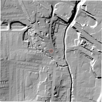 Shaded relief map of the ground around DL11UQ, computed from Environment Agency LiDAR. The ground here sits at about 43 m above sea level and falls 17 m across the surrounding 800 m. Surface water reaching this point runs off ground lying to the north-north-west, 5.7 m higher.