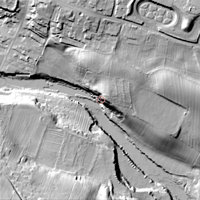 Shaded relief map of the ground around DL128PE, computed from Environment Agency LiDAR. The ground here sits at about 135 m above sea level and falls 47 m across the surrounding 800 m. Surface water reaching this point runs off ground lying to the north-east, 25.2 m higher.