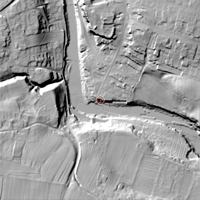Shaded relief map of the ground around DL128QQ, computed from Environment Agency LiDAR. The ground here sits at about 133 m above sea level and falls 58 m across the surrounding 800 m. Surface water reaching this point runs off ground lying to the south-west, 55.0 m higher.