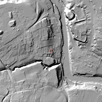 Shaded relief map of the ground around DL129AT, computed from Environment Agency LiDAR. The ground here sits at about 144 m above sea level and falls 56 m across the surrounding 800 m. Surface water reaching this point runs off ground lying to the west-north-west, 13.7 m higher.