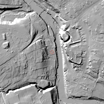 Shaded relief map of the ground around DL129BE, computed from Environment Agency LiDAR. The ground here sits at about 136 m above sea level and falls 42 m across the surrounding 800 m. Surface water reaching this point runs off ground lying to the west, 17.7 m higher.