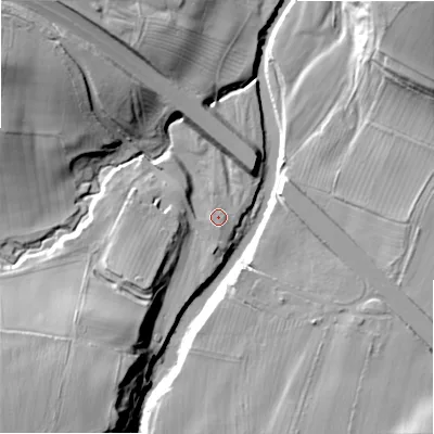 Shaded relief map of the ground around DL129SE, computed from Environment Agency LiDAR. The ground here sits at about 130 m above sea level and falls 40 m across the surrounding 800 m. Surface water reaching this point runs off ground lying to the south, 2.7 m higher.