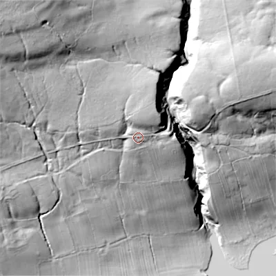 Shaded relief map of the ground around DL129UU, computed from Environment Agency LiDAR. The ground here sits at about 309 m above sea level and falls 94 m across the surrounding 800 m. Surface water reaching this point runs off ground lying to the north, 8.2 m higher.