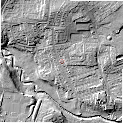 Shaded relief map of the ground around DL12AQ, computed from Environment Agency LiDAR. The ground here sits at about 48 m above sea level and falls 21 m across the surrounding 800 m. Surface water reaching this point runs off ground lying to the north, 13.4 m higher.