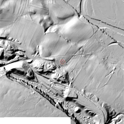 Shaded relief map of the ground around DL132PP, computed from Environment Agency LiDAR. The ground here sits at about 248 m above sea level and falls 138 m across the surrounding 800 m. Surface water reaching this point runs off ground lying to the west-south-west, 33.6 m higher.