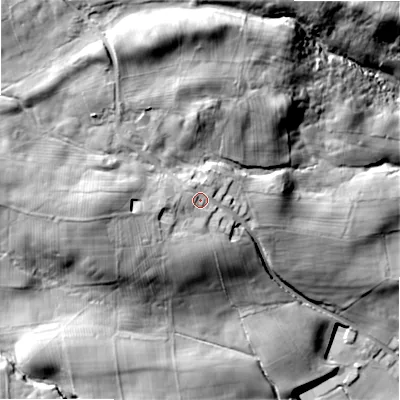 Shaded relief map of the ground around DL135ND, computed from Environment Agency LiDAR. The ground here sits at about 300 m above sea level and falls 63 m across the surrounding 800 m. Surface water reaching this point runs off ground lying to the west-north-west, 3.9 m higher.