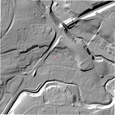 Shaded relief map of the ground around DL146SE, computed from Environment Agency LiDAR. The ground here sits at about 87 m above sea level and falls 29 m across the surrounding 800 m. Surface water reaching this point runs off ground lying to the north-west, 10.4 m higher.