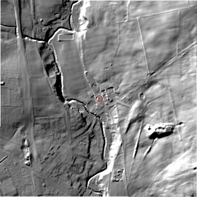 Shaded relief map of the ground around DL158AD, computed from Environment Agency LiDAR. The ground here sits at about 115 m above sea level and falls 57 m across the surrounding 800 m. Surface water reaching this point runs off ground lying to the east-north-east, 35.3 m higher.