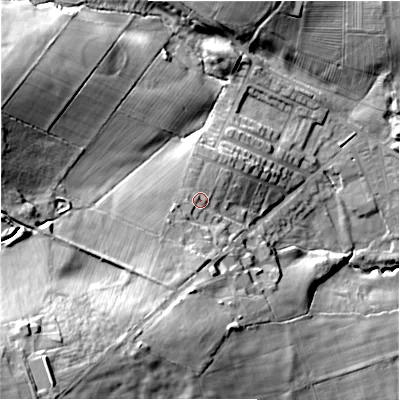 Shaded relief map of the ground around DL158HP, computed from Environment Agency LiDAR. The ground here sits at about 129 m above sea level and falls 54 m across the surrounding 800 m. Surface water reaching this point runs off ground lying to the west, 2.2 m higher.