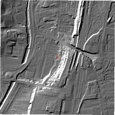 Shaded relief map of the ground around DL15DB, computed from Environment Agency LiDAR. The ground here sits at about 38 m above sea level and falls 18 m across the surrounding 800 m. Surface water reaching this point runs off ground lying to the south, 13.3 m higher.