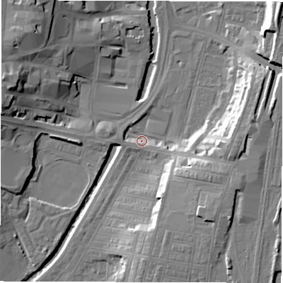 Shaded relief map of the ground around DL15JQ, computed from Environment Agency LiDAR. The ground here sits at about 38 m above sea level and falls 18 m across the surrounding 800 m. Surface water reaching this point runs off ground lying to the east, 13.8 m higher.