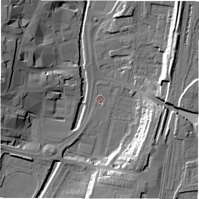Shaded relief map of the ground around DL15LB, computed from Environment Agency LiDAR. The ground here sits at about 38 m above sea level and falls 18 m across the surrounding 800 m. Surface water reaching this point runs off ground lying to the north-east, 15.6 m higher.