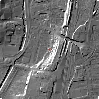 Shaded relief map of the ground around DL15LF, computed from Environment Agency LiDAR. The ground here sits at about 38 m above sea level and falls 18 m across the surrounding 800 m. Surface water reaching this point runs off ground lying to the south, 12.8 m higher.