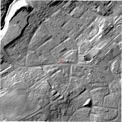 Shaded relief map of the ground around DL57AP, computed from Environment Agency LiDAR. The ground here sits at about 89 m above sea level and falls 12 m across the surrounding 800 m. Surface water reaching this point runs off ground lying to the east-north-east, 6.1 m higher.