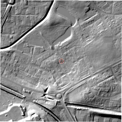 Shaded relief map of the ground around DL57AX, computed from Environment Agency LiDAR. The ground here sits at about 90 m above sea level and falls 22 m across the surrounding 800 m. Surface water reaching this point runs off ground lying to the south, 13.5 m higher.