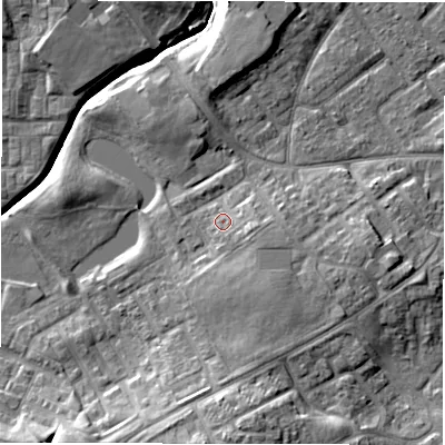 Shaded relief map of the ground around DL57DA, computed from Environment Agency LiDAR. The ground here sits at about 90 m above sea level and falls 13 m across the surrounding 800 m. Surface water reaching this point runs off ground lying to the south-east, 2.4 m higher.