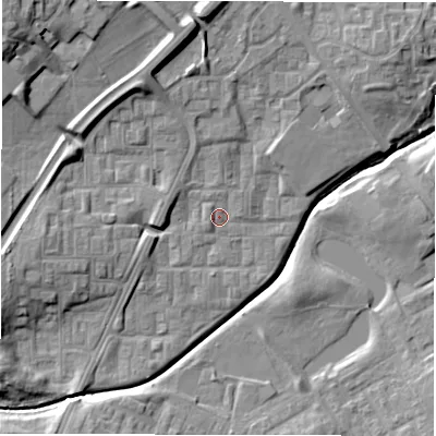 Shaded relief map of the ground around DL57DN, computed from Environment Agency LiDAR. The ground here sits at about 89 m above sea level and falls 16 m across the surrounding 800 m. Surface water reaching this point runs off ground lying to the north-west, 12.2 m higher.