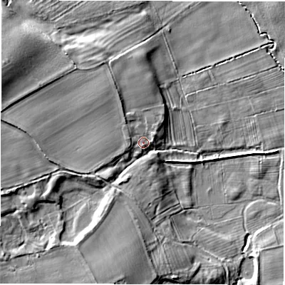 Shaded relief map of the ground around DL70RN, computed from Environment Agency LiDAR. The ground here sits at about 33 m above sea level and falls 11 m across the surrounding 800 m. Surface water reaching this point runs off ground lying to the west, 3.8 m higher.