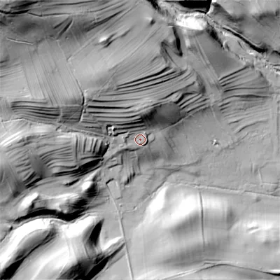 Shaded relief map of the ground around DL84DT, computed from Environment Agency LiDAR. The ground here sits at about 203 m above sea level and falls 83 m across the surrounding 800 m. Surface water reaching this point runs off ground lying to the north-west, 25.5 m higher.