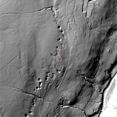 Shaded relief map of the ground around DL84LE, computed from Environment Agency LiDAR. The ground here sits at about 341 m above sea level and falls 128 m across the surrounding 800 m. Surface water reaching this point runs off ground lying to the west, 53.7 m higher.